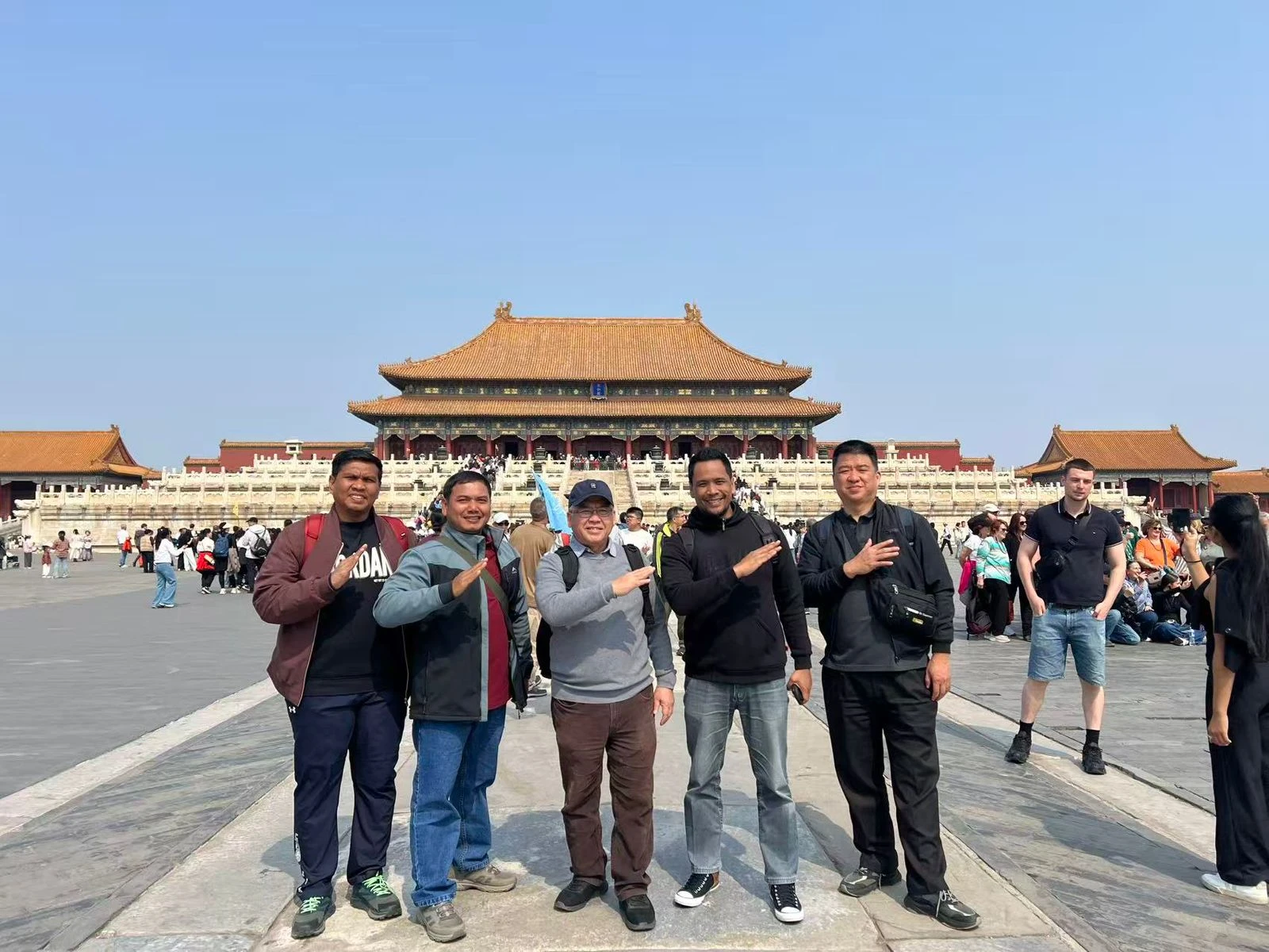 Happy customers exploring magnificent Asian temples with Nayowa Tours